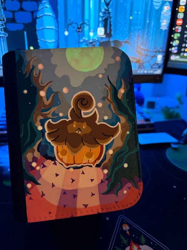 Custom handpainted glow in the dark Pumpkaboo Pokémon toploader binder
