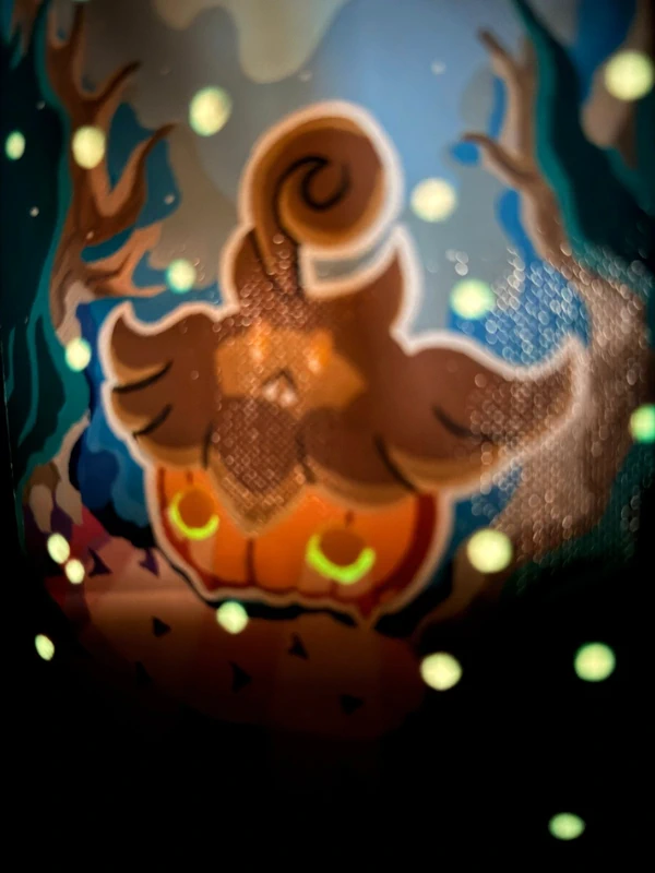 Custom handpainted glow in the dark Pumpkaboo Pokémon toploader binder