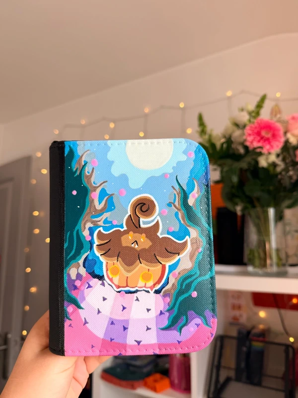 Custom handpainted glow in the dark Pumpkaboo Pokémon toploader binder
