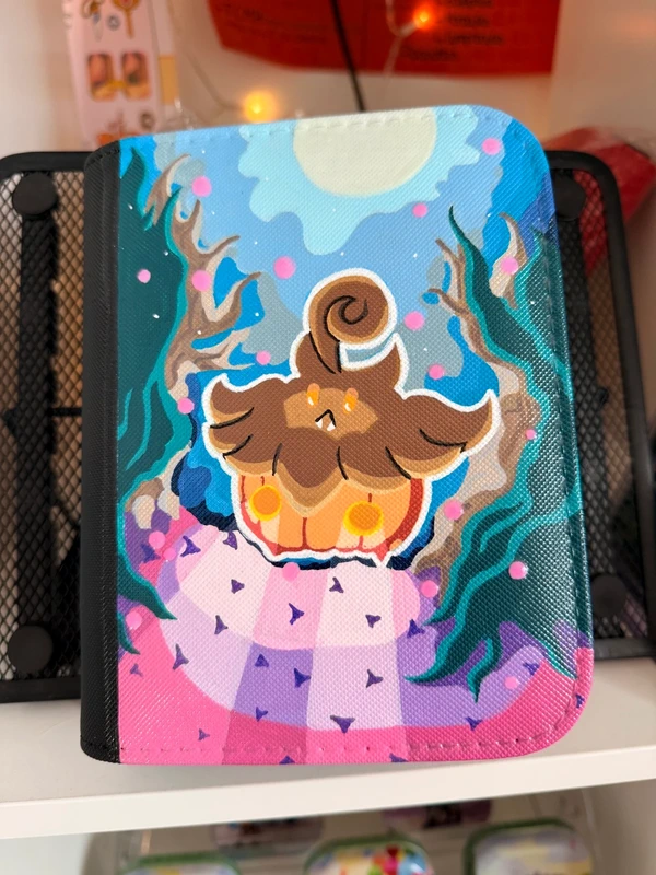 Custom handpainted glow in the dark Pumpkaboo Pokémon toploader binder